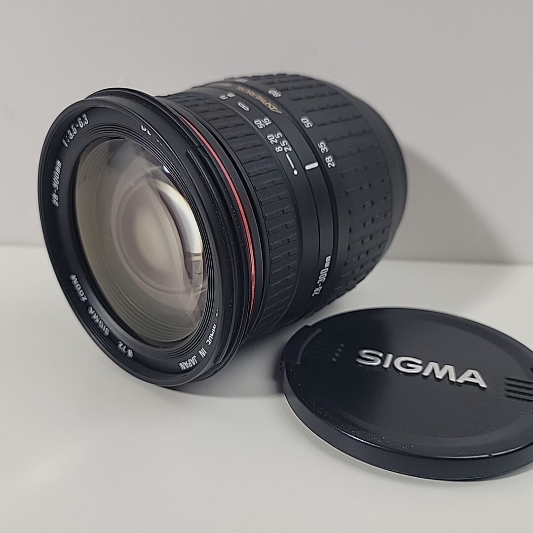 Sigma AF 28-300mm Aspherical IF f3.5-6.3 zoom lens, hood, UV