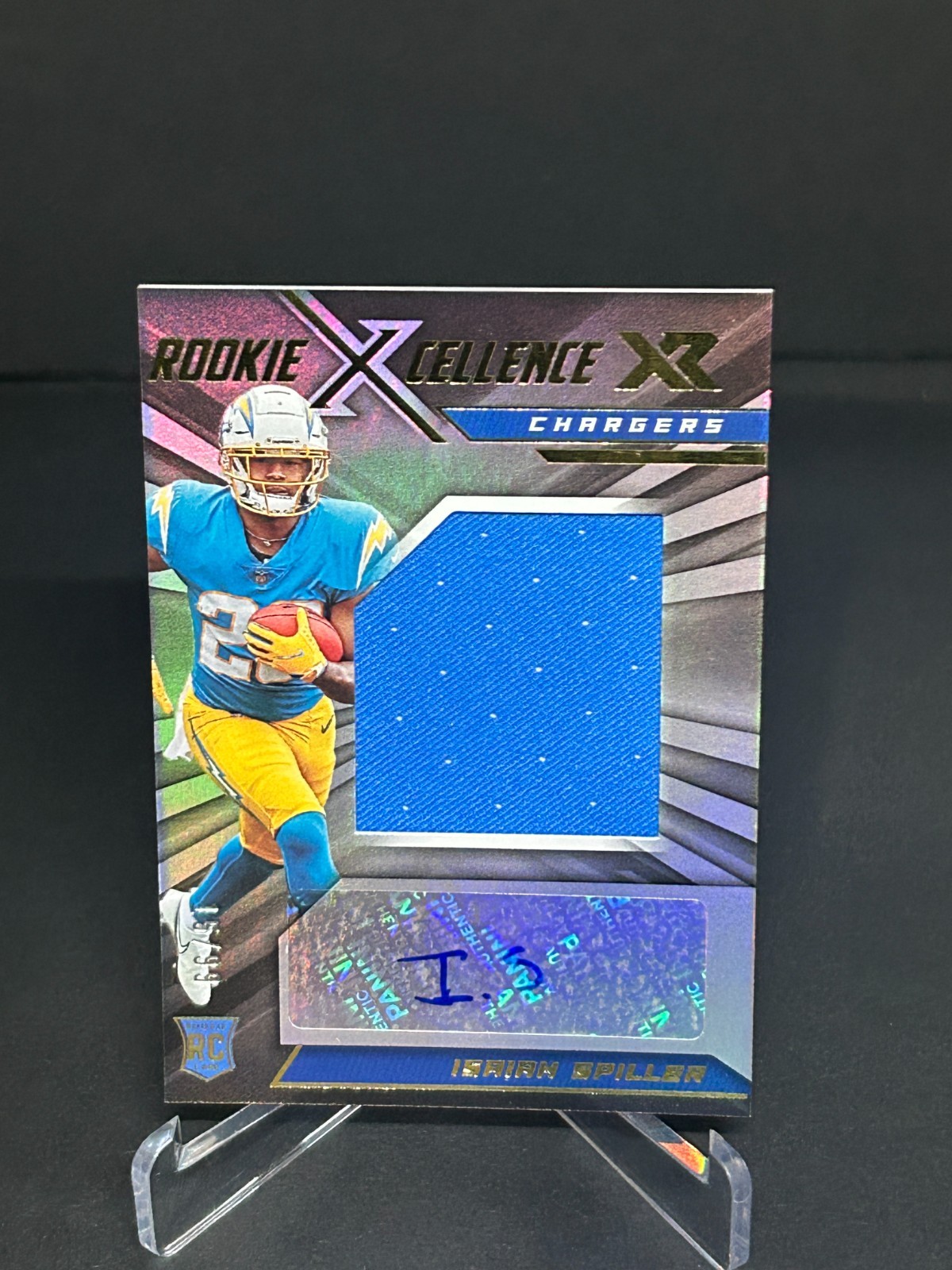 2022 Panini XR - Rookie Triple Swatch Autographs Isaiah Spiller /99