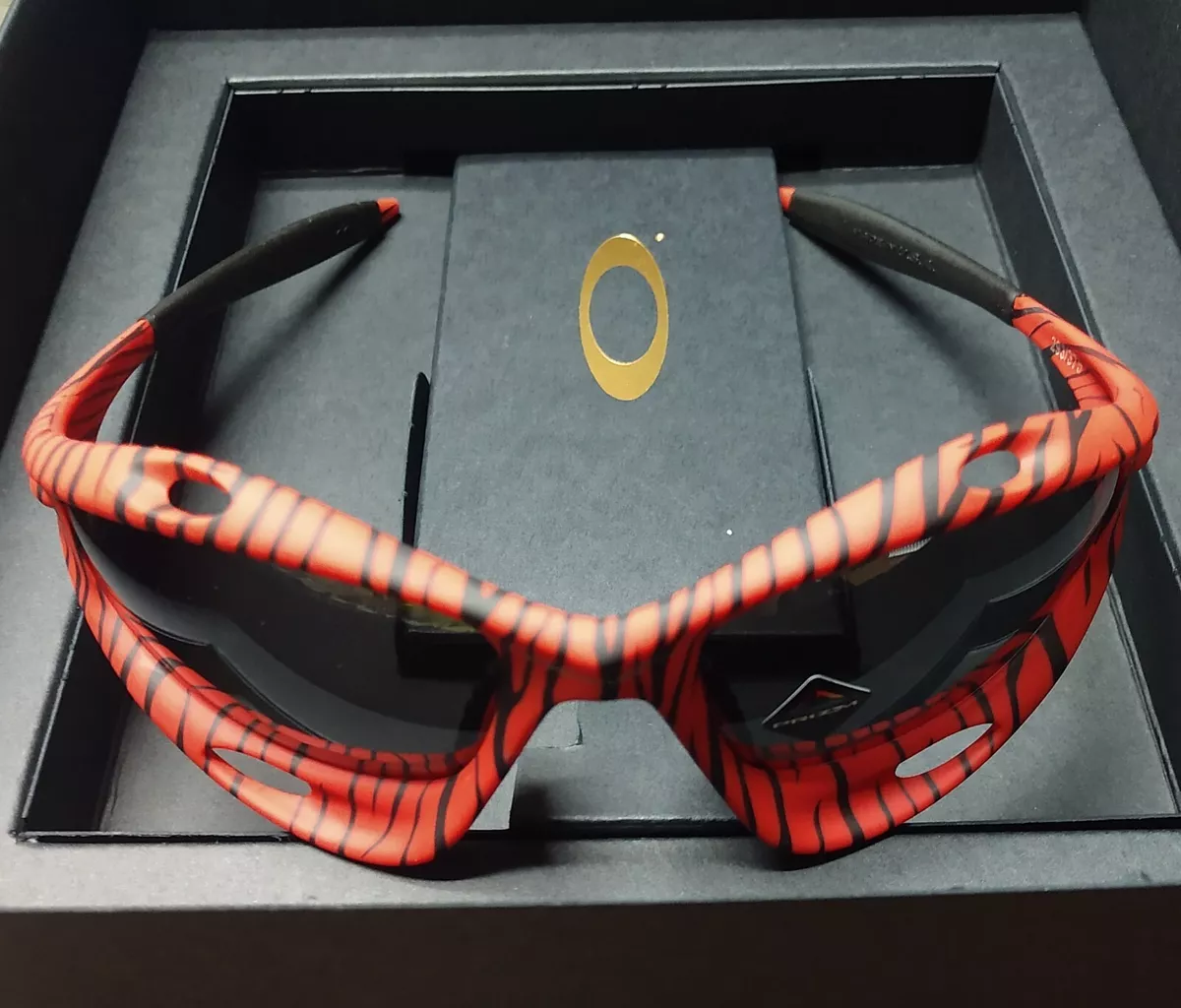 Oakley MUZM Red Tiger / Prizm Black Racing Jacket Sunglasses 340