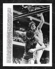 Dec 27 1972 Celtics Dave Cowens (NBA MVP) dunks in DeBusschere's mug Wire Photo