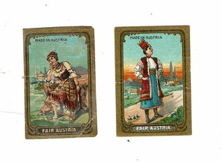 2 etiquetas antiguas Austria Solo c1910s caja de cerillas esmaltadas Feria Austria 48x34mm