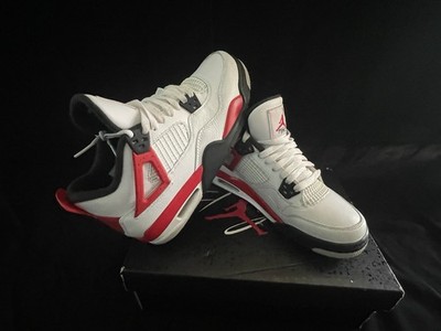 Step up your sneaker game with these Nike Air Jordan 4 Retro  Fire Red  sneakers