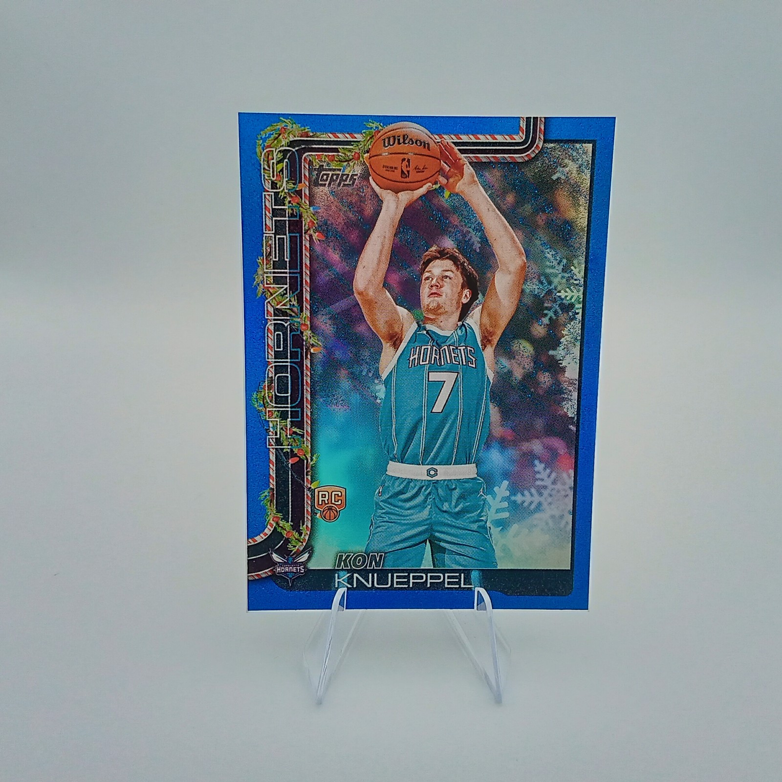 2025-26 Topps Holiday #H164 Kon Knueppel Blue Metallic Glitter Holiday Rookie