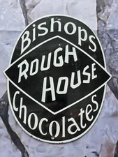 VINTAGE BISHOPS CHOCOLATES ROUGH HOUSE PORCELAIN SIGN 10"×8.5".