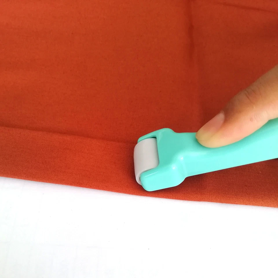 Herramientas de costura Rollo y prensa Trébol Prensa Costuras Tela Rodillo Empujador Rueda de escobilla Foto 2 de 4