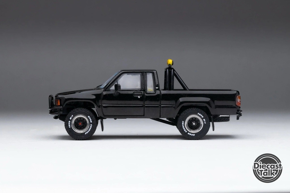 1/64 Toyota 1985 Hilux SR5 xTracab 4x4 Black BTTF DiecastTalk