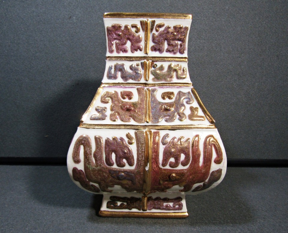 Signed and dated 1960 studio pottery by Ruebel with tribal sculptural influence — a genuine art object, not just a vase.