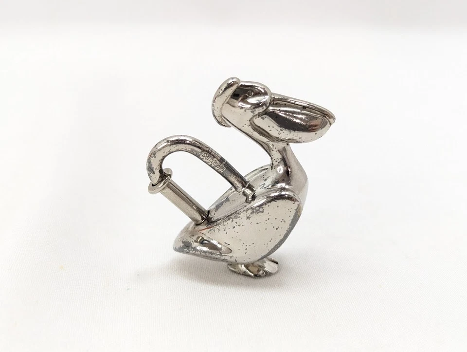 Auténtico llavero colgante bolso plata pelícano cadena hermes 1992 Foto 2 de 4