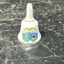 vintage ceramic bell featuring the coat of arms and flag of St. Lucia Ref B28
