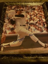 Signed framed Photo with glass protective cover of Reggie Jackson...