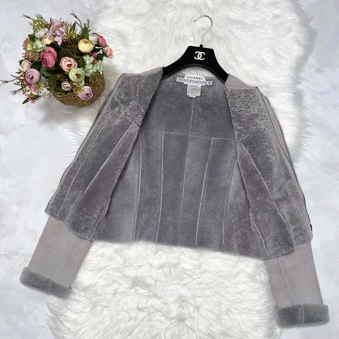 Giacca CHANEL vintage Mouton in pelle senza colletto taglia 40 grigia donna
