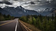 Landscape road mountains overcast pine trees snowy Custom Gaming Mat Desk
