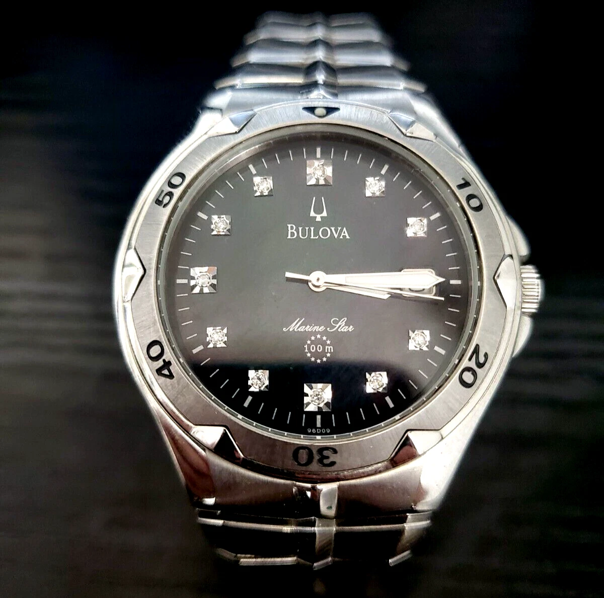 Bulova watch silver top with black face