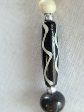 Pendentif Poisson africain fabriqué par un atelier français