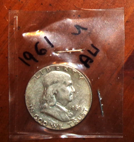 1961 SILVER FRANKLIN HALF DOLLAR ... GRADES "ABOUT UNCIRCULATED"