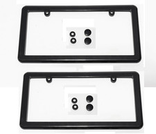 2 marcos universales negros para montaje de etiqueta de matrícula + 4 tapones de rosca nuevos