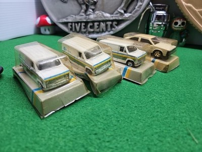 ERTL Pioneers Chvy Citation X11 2621 - Bell System 3 Ford Vans 30905  blstr pack