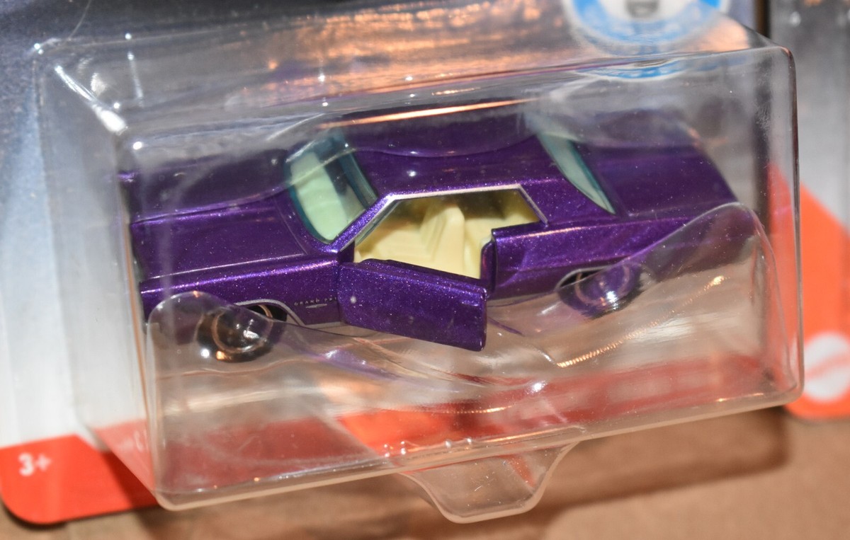MATCHBOX '83 BUICK RIVIERA CONVERTIBLE & '64 PONTIAC GRAND PRIX