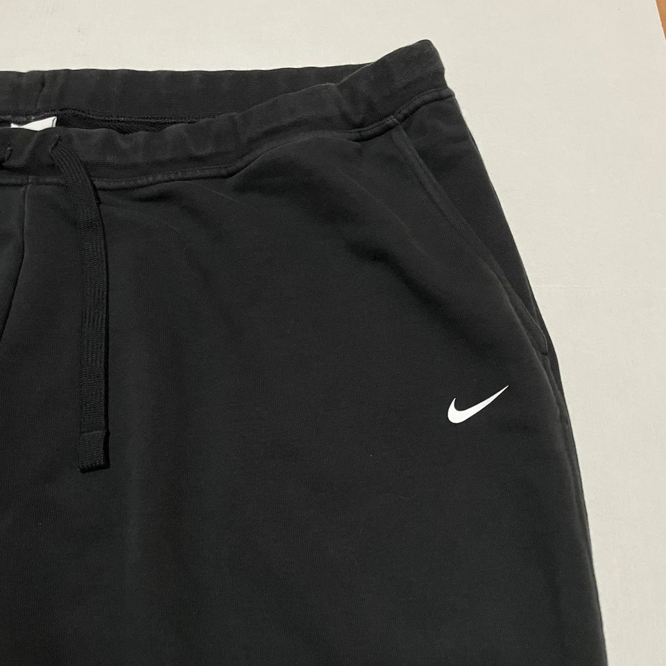 Pantalones deportivos Nike Joggers de vellón cónico para mujer 3X DB6080-010 negros Foto 2 de 4
