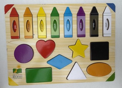 The Learning Journey Wooden Colors & Shapes Peg Puzzle Board w/ Crayon Pieces
