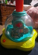 Bright Starts SPINNING TOP WITH MUSIC AND BUBBLING SOUNDS WORKS 