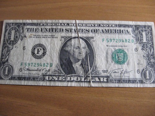 1 $ one dollar bill was creased when inked 1974 irregular