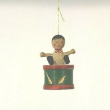 CHRISTMAS ORNAMENT CHILD SITTING ON A DRUM