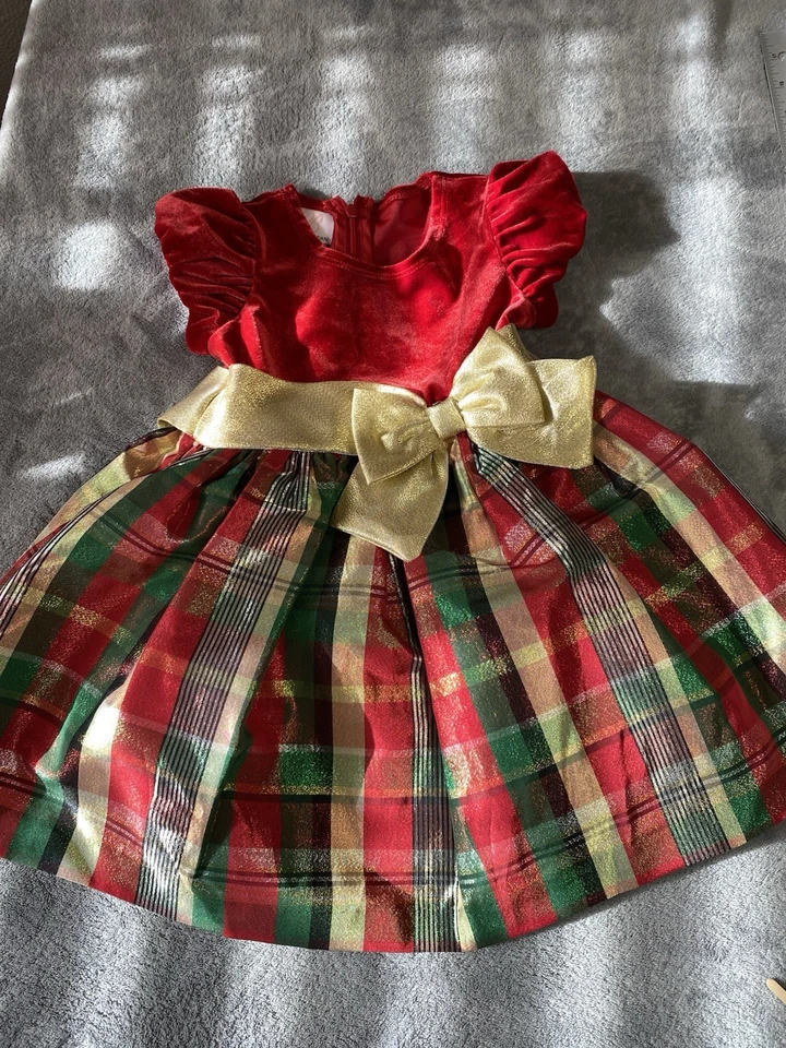 Vestido de vacaciones Bonnie Jean para niñas talla 2T rojo con volantes debajo de la pajarita dorada Foto 2 de 4