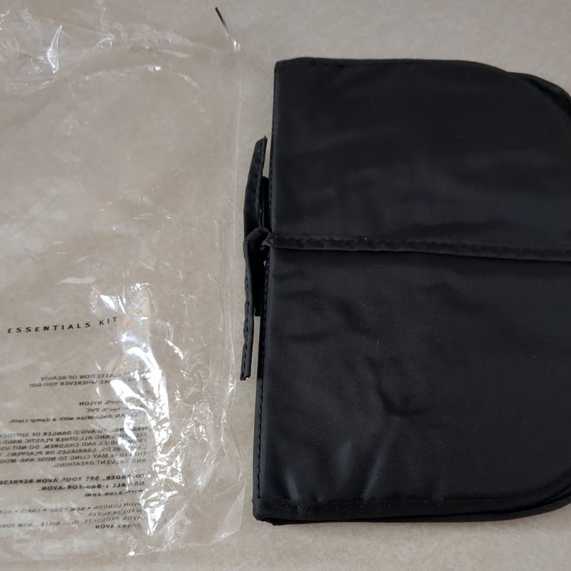 Avon black bag  with 7 accessories brand new never used