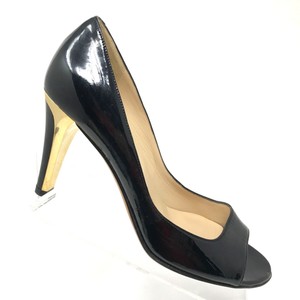 jimmy choo black and gold shoes