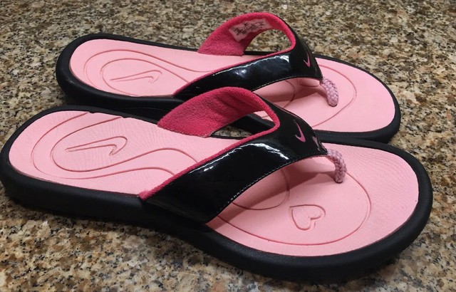 pink and black flip flops