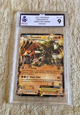 MGC HOLO 2012 POKEMON GROUDON EX DUNKLE ENTDECKER GRADE 9 054/108