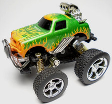 MADE IN CHINA GREEN 2 1/2" PULL BACK & GO 4X4 MONSTER CAR TRUCK W/ ORANGE FLAMES