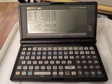 HP 100LX Pocket Computer with 48MB PCMCIA card