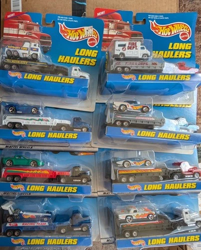 1997 & 98  Hot Wheels Long Haulers Vintage 2 Sets Of 4 Trucks-Complete Sets NIP
