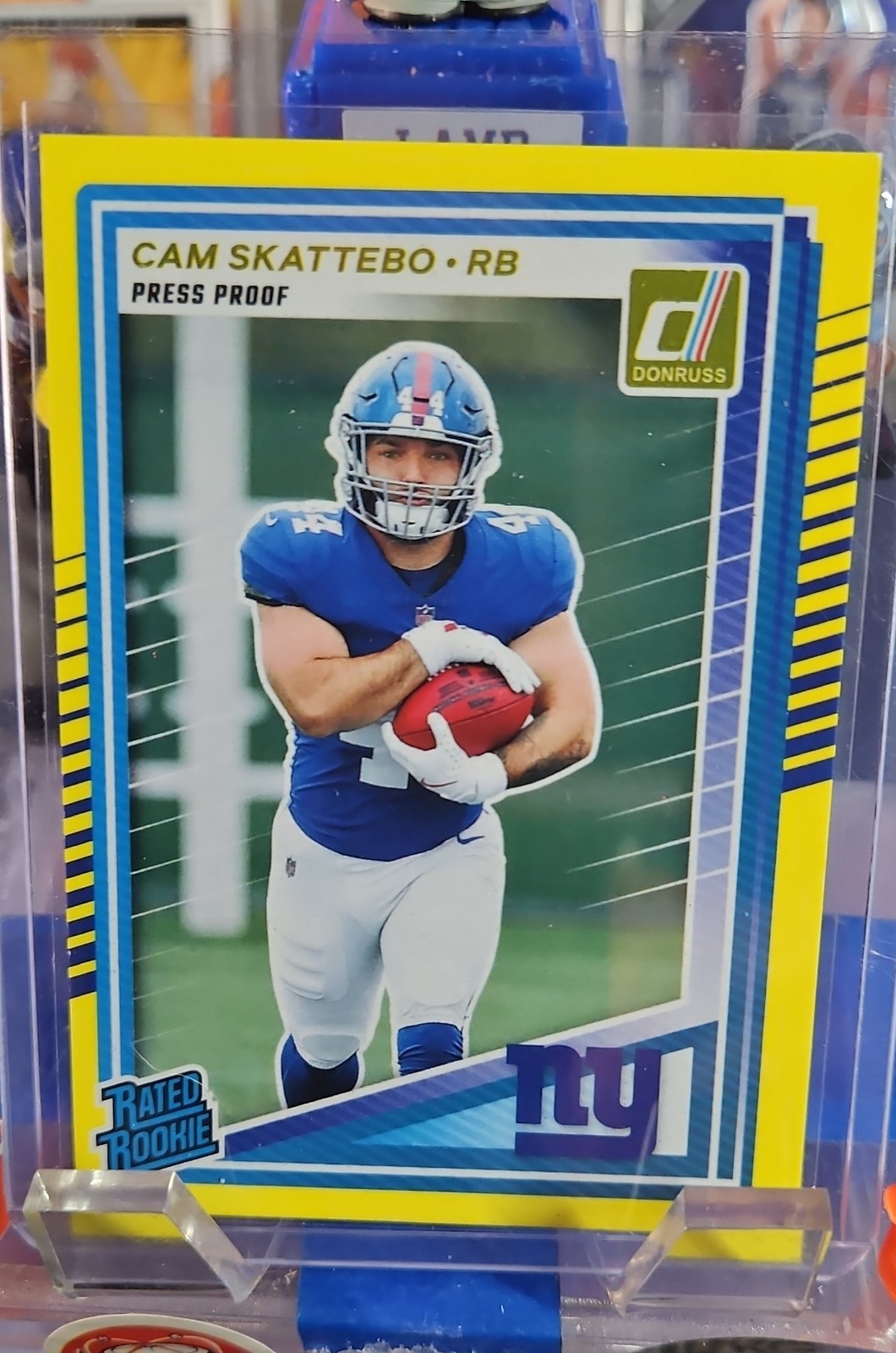 2025 Panini Donruss - Rated Rookie Cam Skattebo #302 Press Proof Yellow (RC)