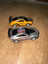 1:43 slot car TRUNBO 68 And Police Runs