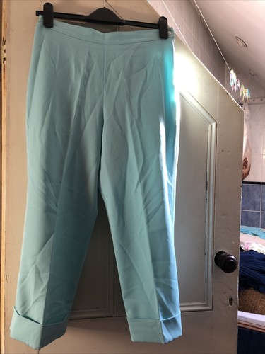light turquoise pants