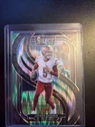 2024 Panini Select - Premier Level Jayden Daniels Black & Green Shock Prizm (RC)
