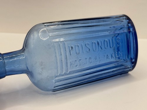 Old blue glass Poison bottle, Poisonous not to be taken