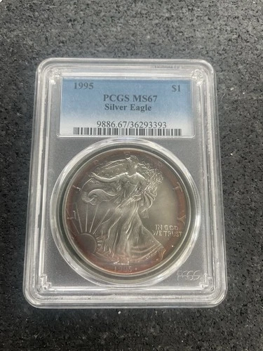 1995 American Silver Eagle $1 – PCGS MS67 – Spectacular Rainbow Toning