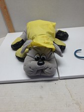 Pound Puppies plush toy wearing a yellow rain poncho complete
