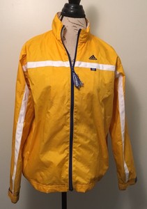 yellow adidas jacket with white stripes