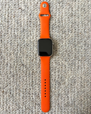 Apple Watch Hermes Series 7 45mm Silver Aluminum Case Orange Silicone Band 32GB