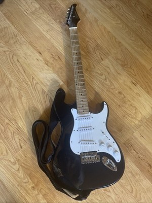 Silverstone Electric Guitar  Black Body, White Pickguard   Used  good condition