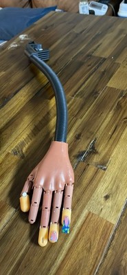 Nail Technician Practice Hand Brown and Clear Nails