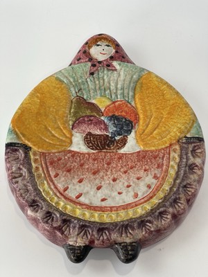 The Cellar Macy s Italy Round Lady Holding Basket Kitchen Wall Decor Trivet