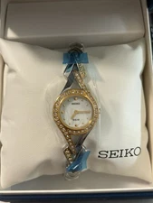 Seiko Women's SUP174 Two Tone Swarovski Crystal Accent MOP Dial Watch