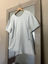 Free People FP Movement Light Blue Short Sleeved Hot Shot Tee Romper Size Medium