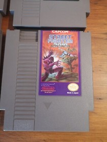 4 LOT NES games Dragon Warrior Muppet Adventure Street Fighter Mario/Duck Hunt